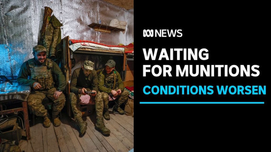 Waiting for Munitions, Conditions Worsen: Three soldiers sit in makeshift quarters.