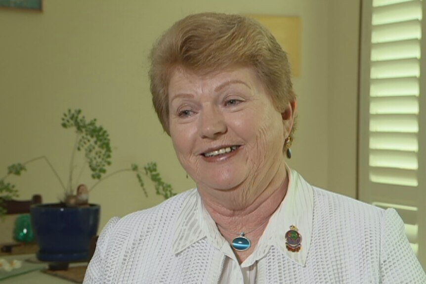 headshot of Pat McCabe in her office