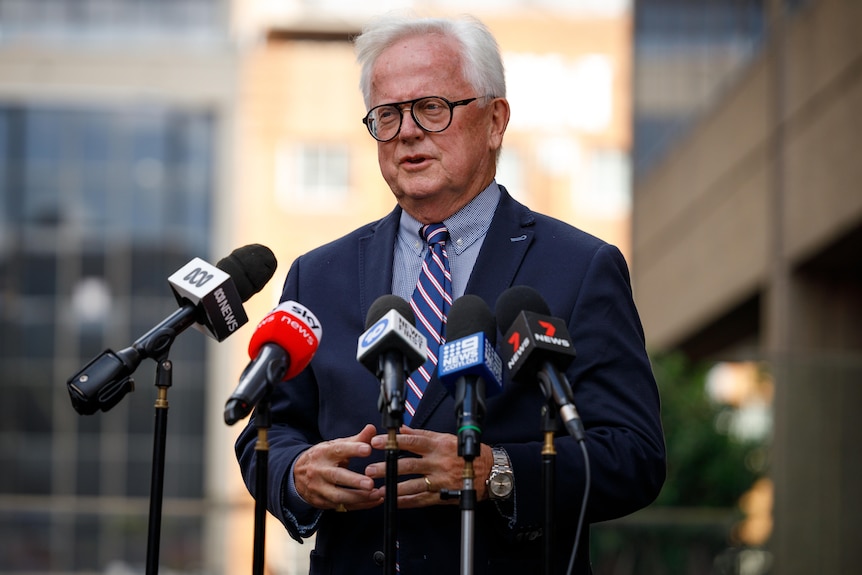 Philip Crawford talks during a press conference