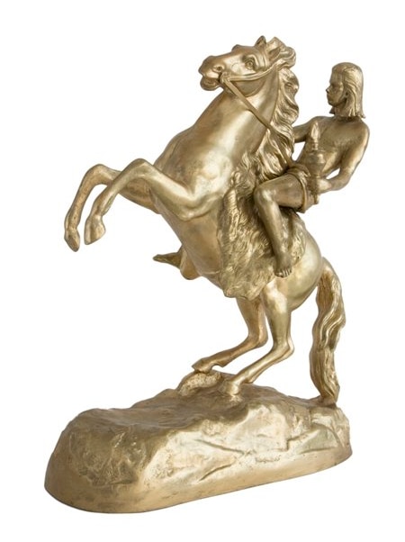 A sculpture of musician Nick Cave astride a rearing horse, dressed in a loin cloth