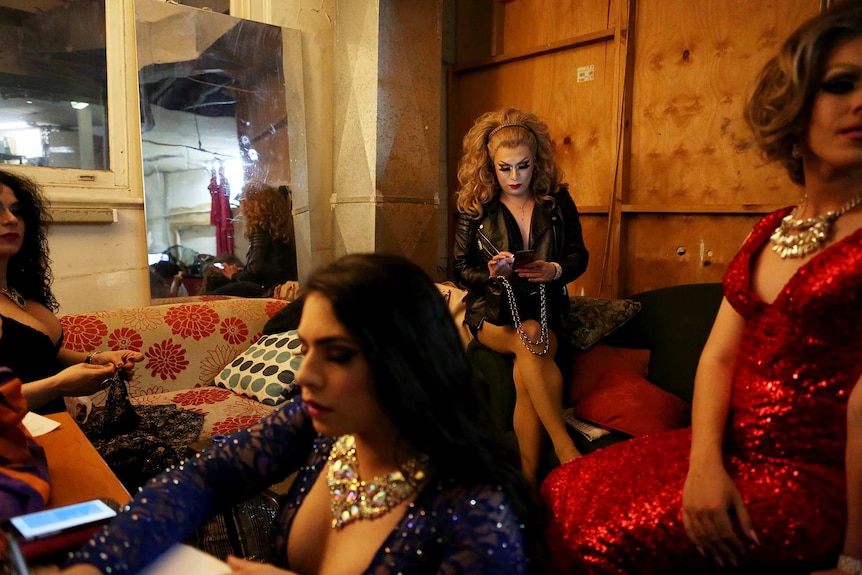 Performers wait backstage before their debut at Trans Glamoré.
