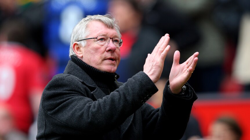 Sir Alex Ferguson applauds crowd