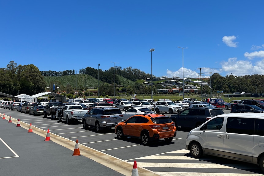 Cars queued up at the COVID testing site in Coffs Harbour
