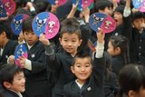 Japanese students selected Olympic mascots.