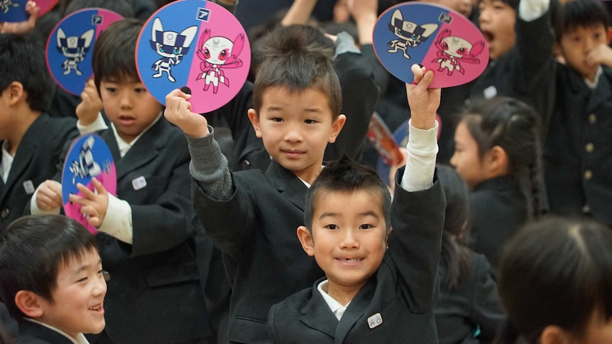 Japanese students selected Olympic mascots.