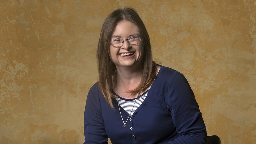 A young woman with down syndrome.