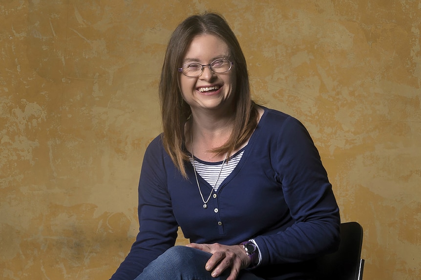 A young woman with down syndrome.
