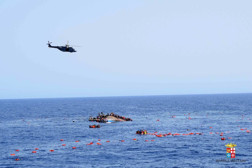 Rescuers tackle boat capsize