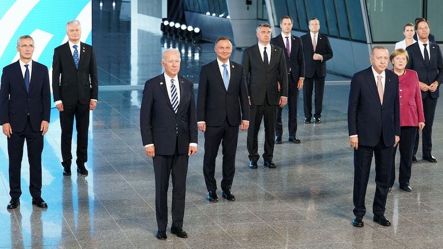 US President Joe Biden and other NATO heads of the states and governments pose for a family photo during the NATO summit.