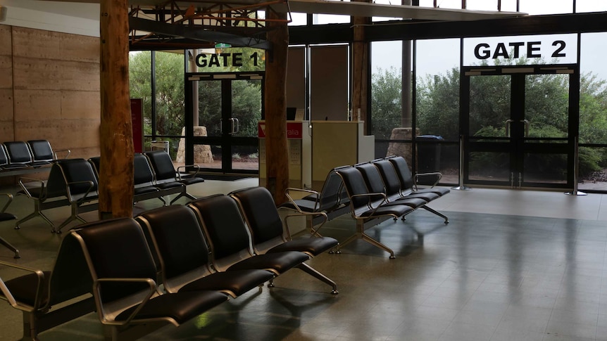 An airport terminal with no passengers