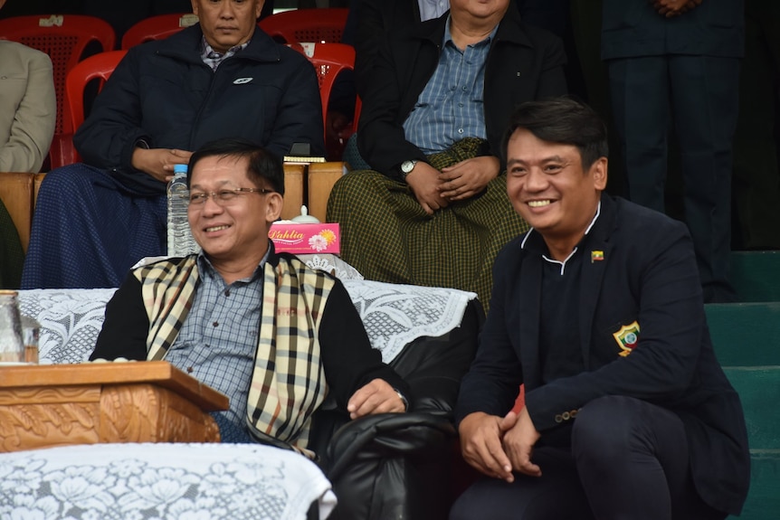 Junta leader Min Aung Hlaing pictured smiling with Shan United FC chairman Khun Naung Myint Wai in 2019. 
