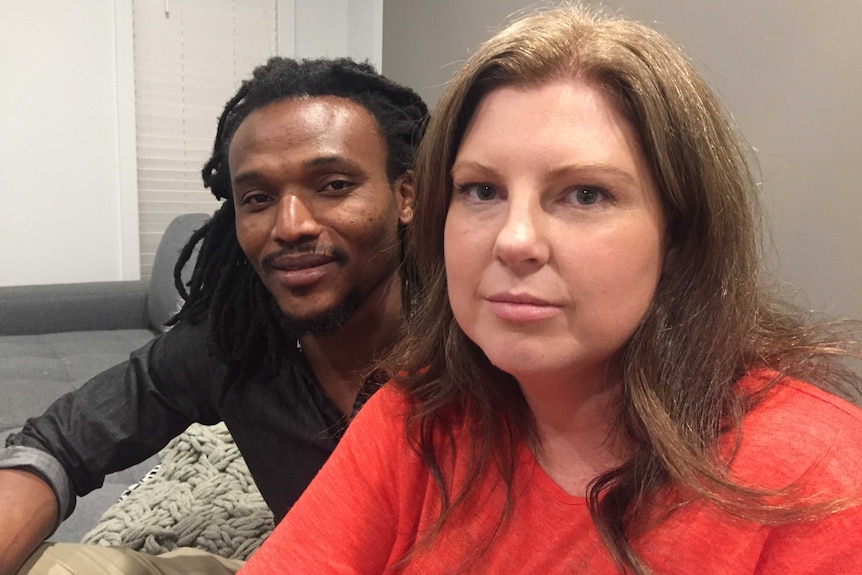 Amani Ntabaye and Naomi Manning sit on a sofa