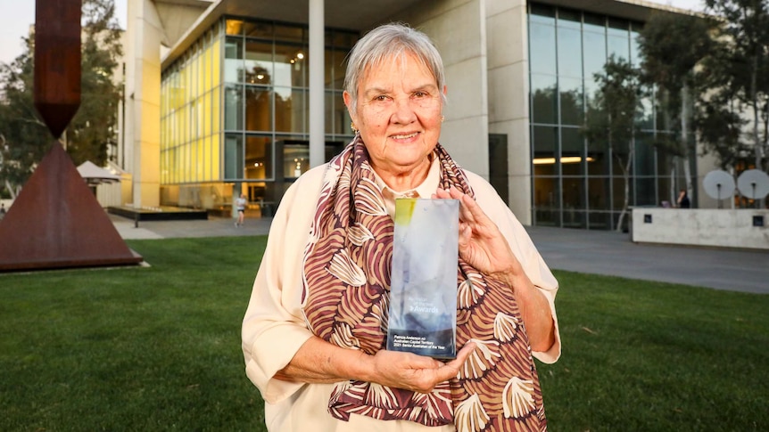 2021 ACT Senior Australian of the Year, Pat Anderson with her award outside National Gallery of Australia.