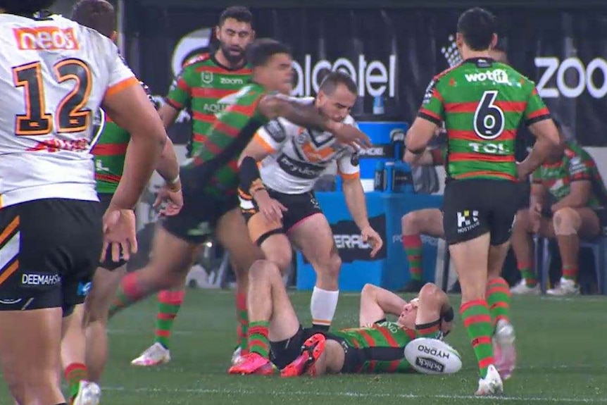 South Sydney's Latrell Mitchell hits Wests Tigers' Josh Reynolds high from behind during their NRL game.