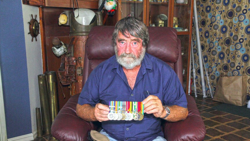 Retired SAS Sergeant Ian Stiles with his service medals.