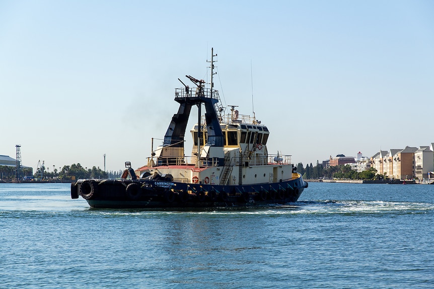 A tug turns on Newcastle harbour.