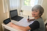 Lucas at his desk