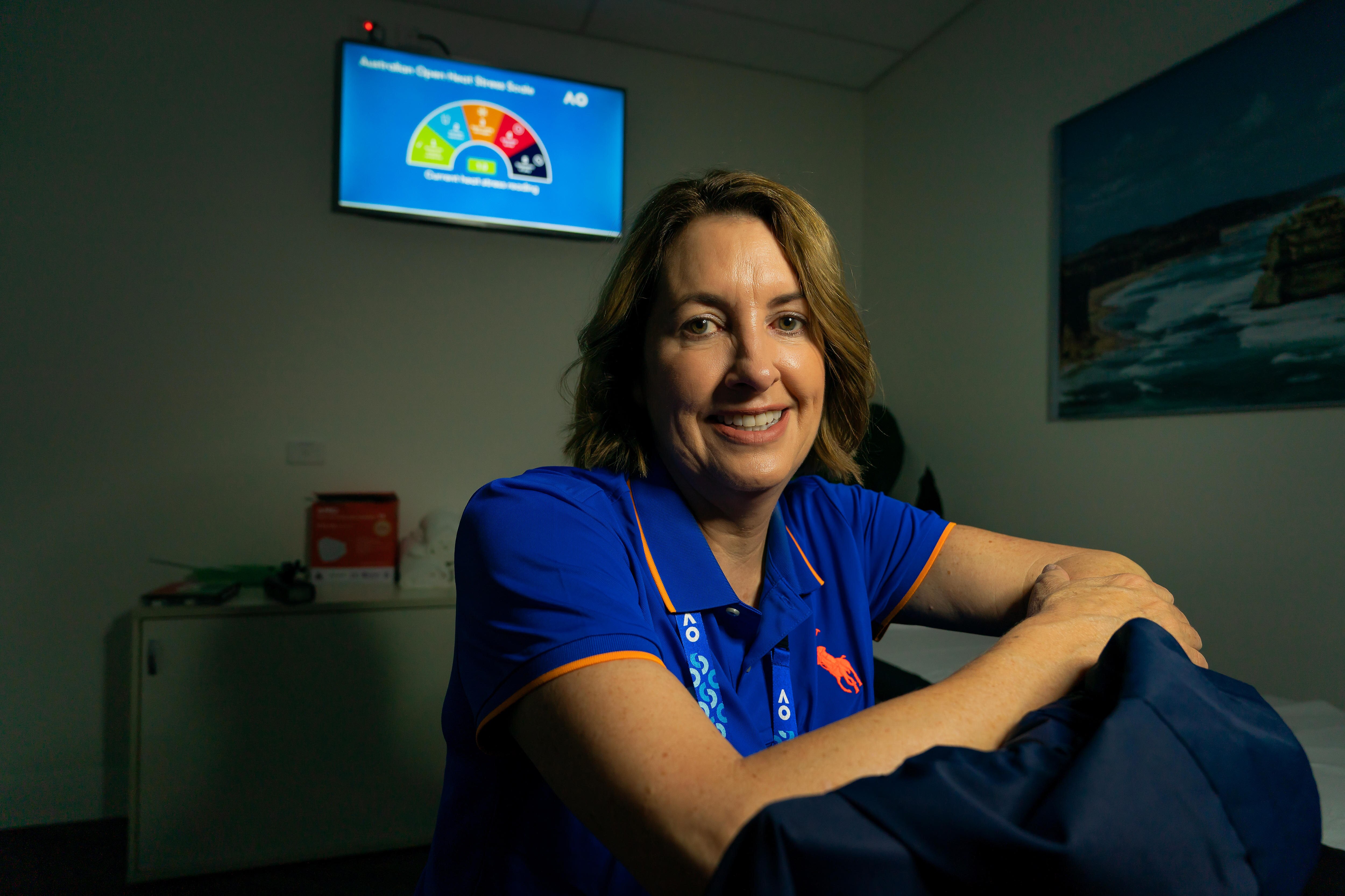 Carolyn Broderick smiles at the camera.