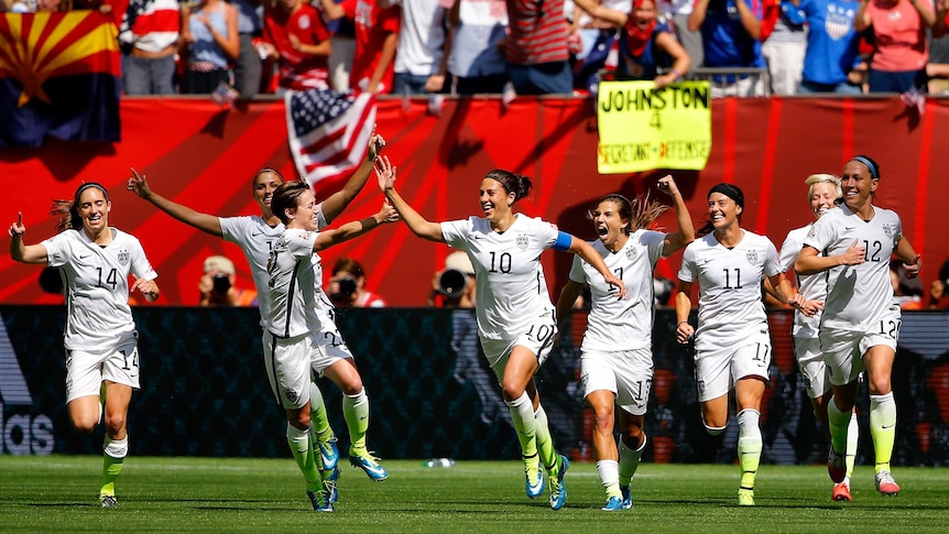USA celebrates Carli Lloyd goal against Japan