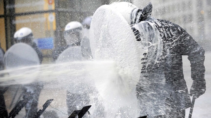 Milk used during protest by farmers in Brussels.