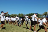 The PNG team taking part in team building games ahead of the Pacific Games