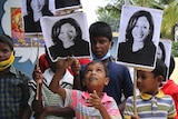 Indian children hold placards of U.S. Vice President-elect Kamala Harris