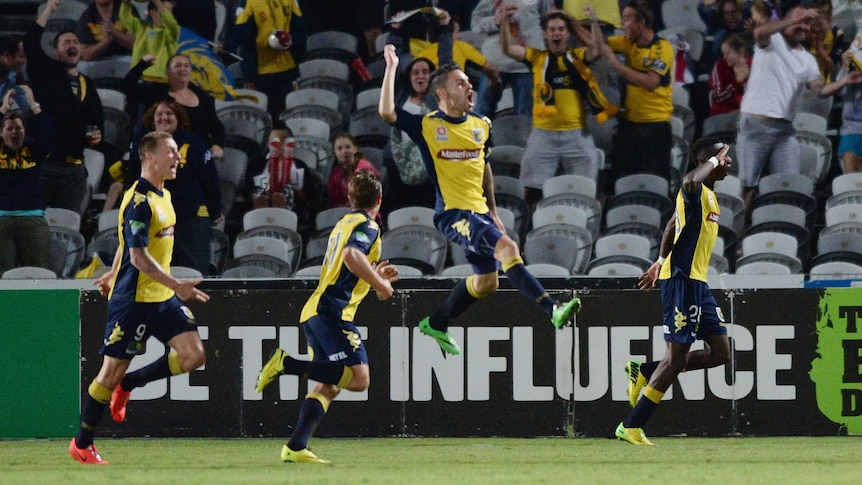 Winning goal ... The Mariners' celebrate after Bernie Ibini scores