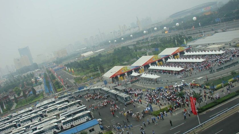 Beijing countdown: Crowds queue ahead of the opening ceremony.