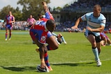 Knights winger Akuila Uate touches down for his first try of the season.
