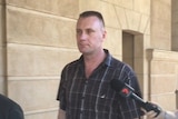 Gabriel Ivanyi outside Adelaide courtrooms.
