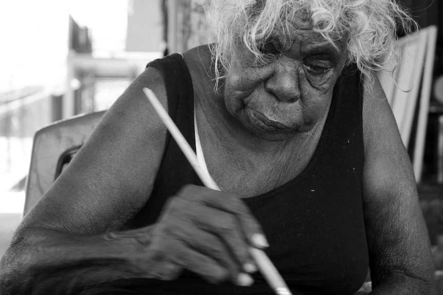 Mabel Juli paints at the Warmun Art Centre, in WA's East Kimberley.