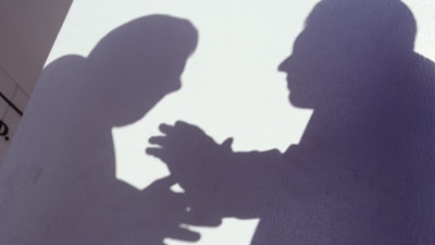 File photo: Shadow of two men talking (Getty Creative Images)