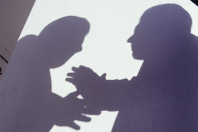 File photo: Shadow of two men talking (Getty Creative Images)