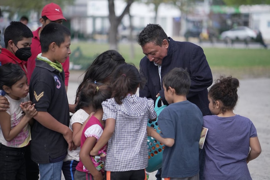 Aid workers hand out food and supplies in Mexico