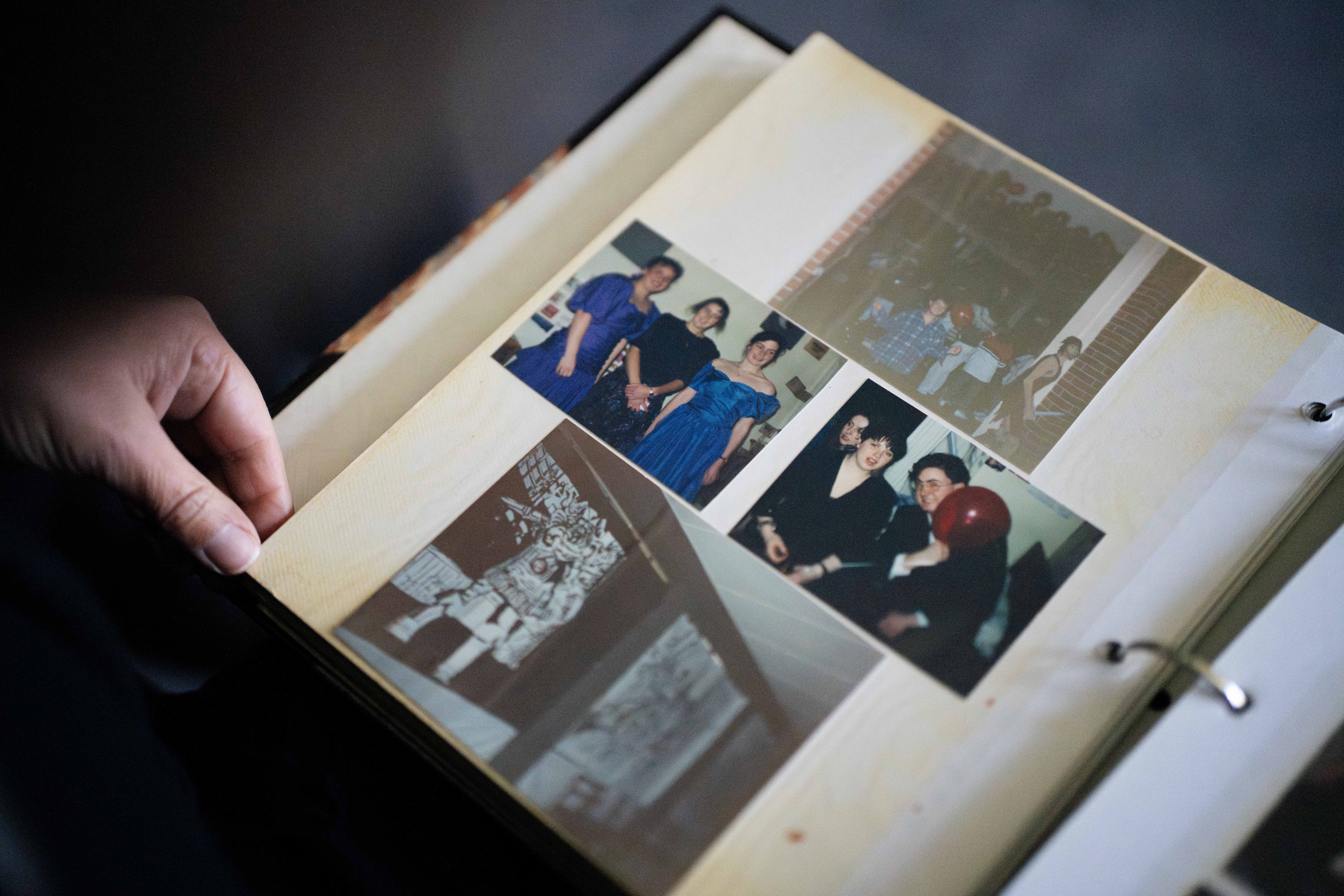 Women look at a photo album