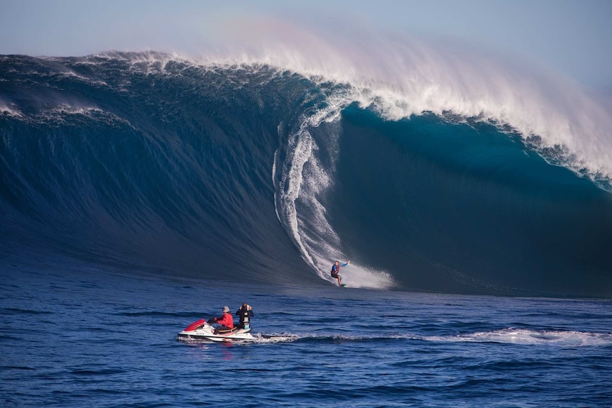Man surfing a large wave