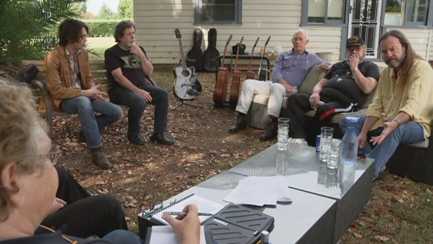 Defence Force veterans at a songwriting session.
