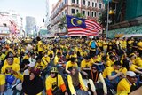 Anti-government protesters occupy a street during a rally in Kuala Lumpur, Malaysia.