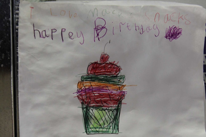 A child-drawn birthday card, wishing a cafe a happy 70th birthday