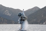 An underwater test-firing of a strategic submarine ballistic missile.