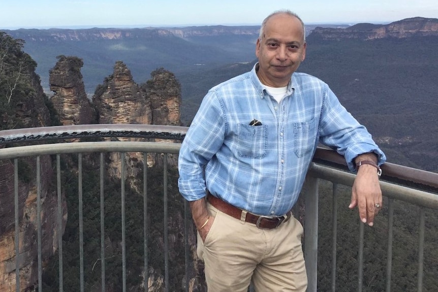 Jaswinder Chawla poses at a lookout in the Blue Mountains. 