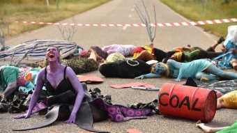 Theatrical anti-coal action on road