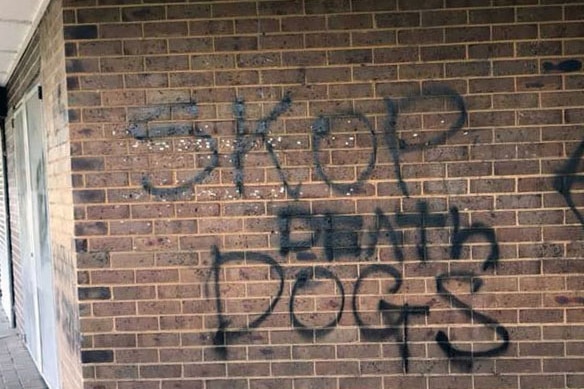 Stop death dogs graffiti on a wall at the Lalor United Sloga Football Club.