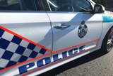 Side photo of Queensland police car.
