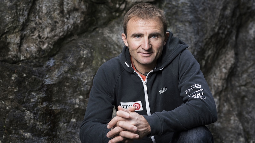 Swiss climber Ueli Steck poses for a photo at the foot of a climbing wall in Wilderswil, Canton of Berne, Switzerland.