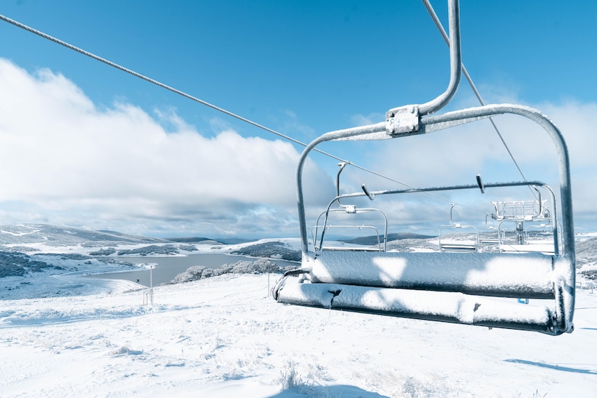 Chair lift covered in snow at Falls Creek ski field