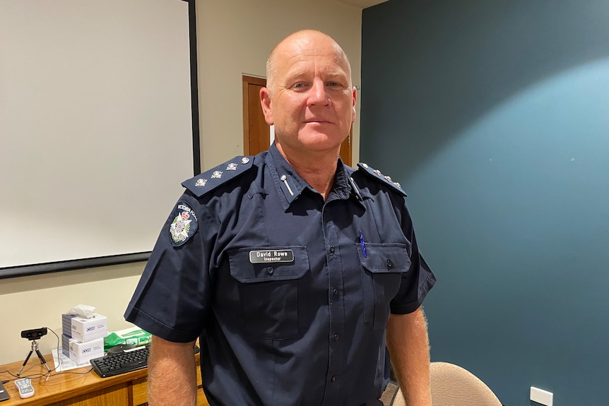 A male Victorian police officer in uniform