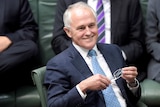 Prime Minister Malcolm Turnbull smiles during House of Representatives Question Time at Parliament House