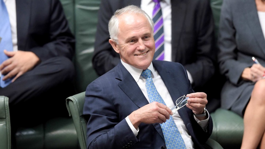 Prime Minister Malcolm Turnbull smiles during House of Representatives Question Time at Parliament House