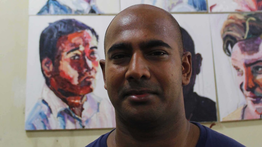 Myuran Sukumaran with paintings